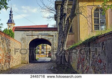 Archway leading to church, Niederlausitz, Brandenburg, Germany View Large Photo Image Stock Photograph - Archway leading to church, Niederlausitz, Brandenburg, Germany . Fotosearch