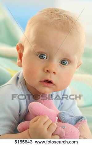Stock Image - Astonished blond baby . Fotosearch