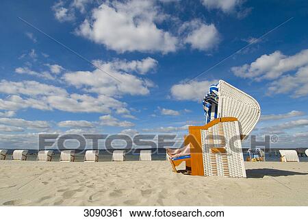 Beach chairs at beach, Gluecksburg, Schleswig-Holstein, Germany View Large Photo Image Stock Image - Beach chairs at beach, Gluecksburg, Schleswig-Holstein, Germany . Fotosearch