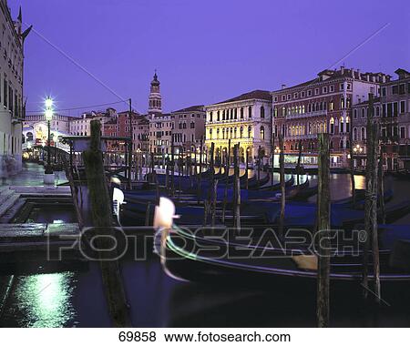 Stock Photo - Boats moored in canal at night, Canal, Grand Canal, Venice, Italy . Fotosearch