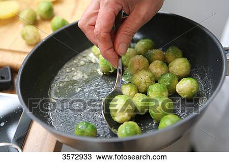 Stock Image - Brussels sprouts in a pan . Fotosearch