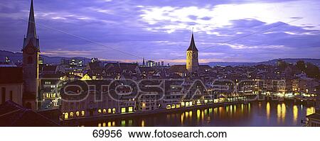 Stock Photograph - Buildings lit up at night, Altstadt, Zurich, Switzerland . Fotosearch