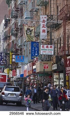 Busy shopping street in Chinatown, New York City, USA View Large Photo Image Stock Photograph - Busy shopping street in Chinatown, New York City, USA . Fotosearch