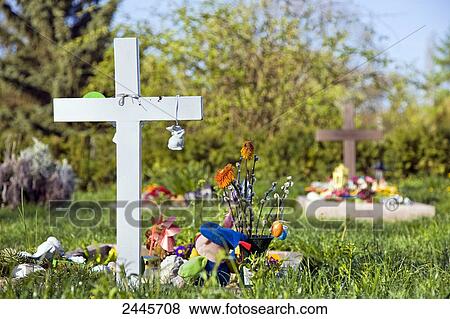 Child grave in cemetery, Friedrichshain, Berlin, Germany View Large Photo Image Stock Photo - Child grave in cemetery, Friedrichshain, Berlin, Germany . Fotosearch