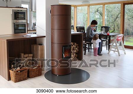 Stock Image - Chimney in open-plan kitchen . Fotosearch