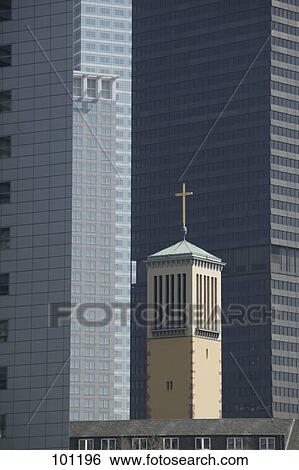 Church in front of office buildings, Frankfurt, Hesse, Germany View Large Photo Image Stock Photograph - Church in front of office buildings, Frankfurt, Hesse, Germany . Fotosearch
