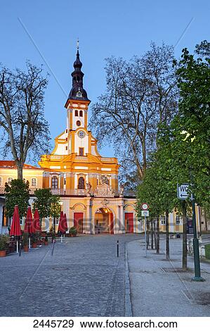Stock Photo - Church lit up at dusk, Niederlausitz, Brandenburg, Germany . Fotosearch