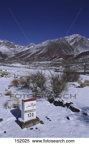 Close-up of a distance sign, Tizi-n Ticha, High Atlas Mountains, Morocco View Large Photo Image Stock Photography - Close-up of a distance sign, Tizi-n Ticha, High Atlas Mountains, Morocco . Fotosearch
