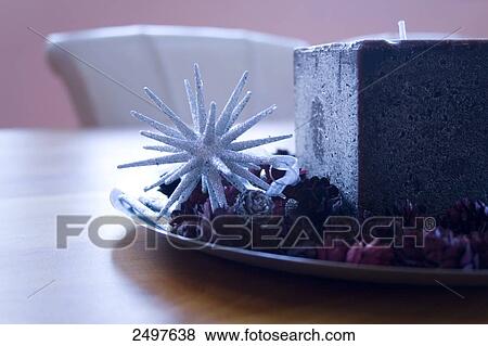 Close-up of Christmas decoration on plate View Large Photo Image Stock Photo - Close-up of Christmas decoration on plate . Fotosearch