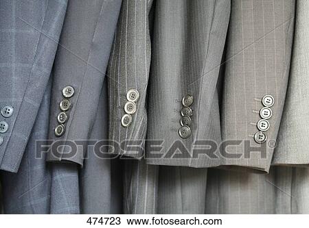 Close-up of display rack of clothing View Large Photo Image Stock Image - Close-up of display rack of clothing . Fotosearch