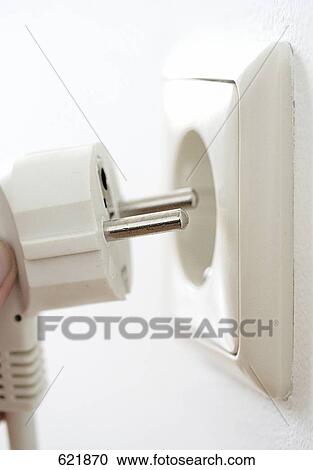 Stock Image - Close-up of electric plug . Fotosearch
