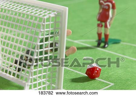 Close-up of figurines of soccer players View Large Photo Image Stock Image - Close-up of figurines of soccer players . Fotosearch