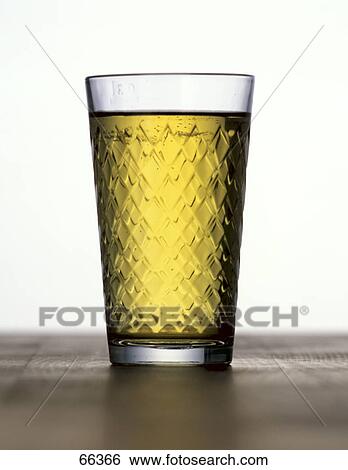 Close-up of glass of apple juice View Large Photo Image Stock Photograph - Close-up of glass of apple juice . Fotosearch