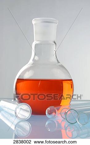 Stock Image - Close-up of laboratory beaker and test tubes . Fotosearch