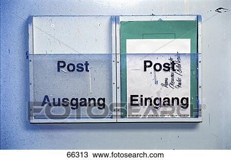 Close-up of mail boxes on wall View Large Photo Image Stock Image - Close-up of mail boxes on wall . Fotosearch