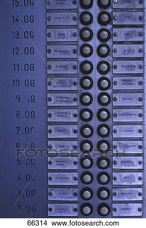 Close-up of nameplates with doorbells View Large Photo Image Picture - Close-up of nameplates with doorbells . Fotosearch