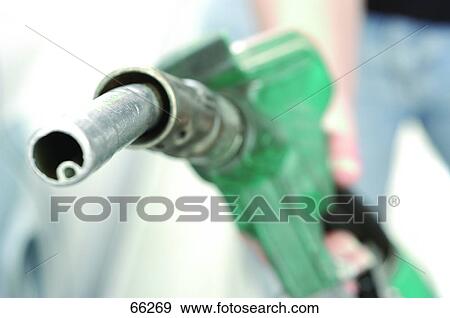 Stock Photo - Close-up of nozzle of fuel pump . Fotosearch