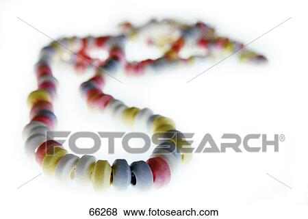 Stock Photo - Close-up of pills chain necklace . Fotosearch