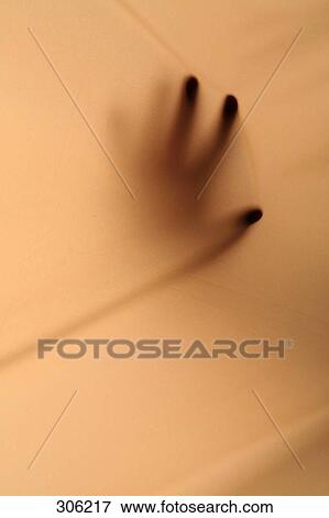 Close-up of shadow of person's hand View Large Photo Image Stock Photo - Close-up of shadow of person's hand . Fotosearch