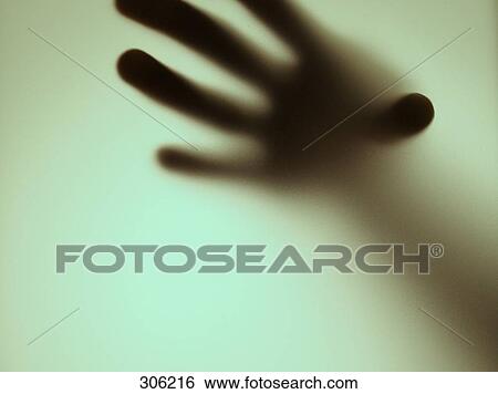 Close-up of shadow of person's hand View Large Photo Image Stock Photograph - Close-up of shadow of person's hand . Fotosearch