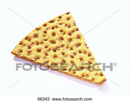 Stock Image - Close-up of slice of crisp bread . Fotosearch