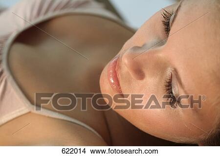 Close-up of young woman View Large Photo Image Picture - Close-up of young woman . Fotosearch