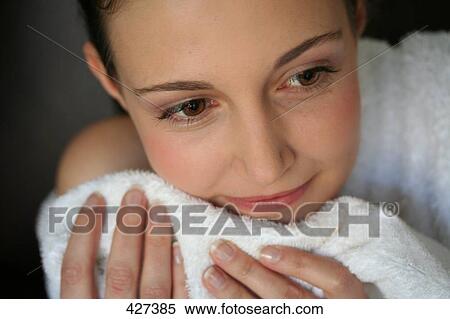 Close-up of young woman smiling View Large Photo Image Stock Photography - Close-up of young woman smiling . Fotosearch