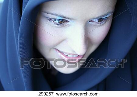 Stock Photo - Close-up young woman smiling . Fotosearch