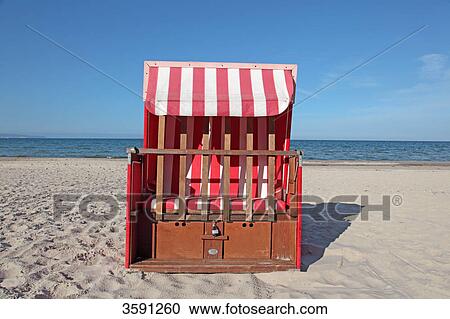 Closed beach chair at the beach of Kuehlungsborn, Germany View Large Photo Image Stock Image - Closed beach chair at the beach of Kuehlungsborn, Germany . Fotosearch