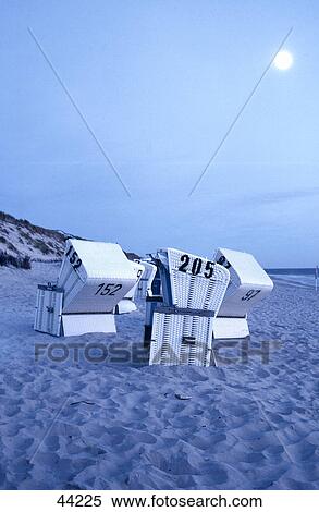 Stock Photography - Deck chairs on beach at dusk, List, Sylt, Germany . Fotosearch