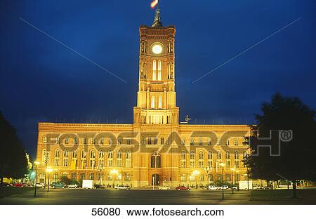 Stock Image - Facade of red city hall illuminated at night, Berlin, Germany, Europe . Fotosearch