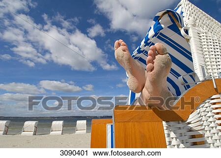 Feet in beach chair, Gluecksburg, Schleswig-Holstein, Germany View Large Photo Image Stock Image - Feet in beach chair, Gluecksburg, Schleswig-Holstein, Germany . Fotosearch