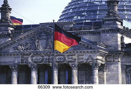 Stock Photo - Flags on parliament building, Bundestag, Berlin, Germany . Fotosearch