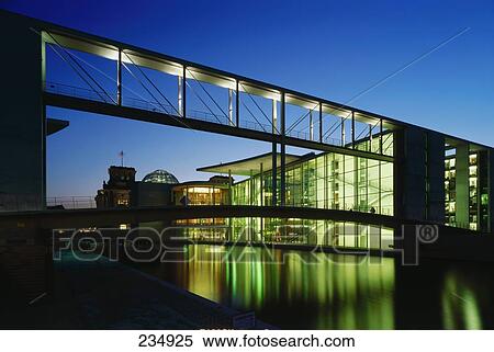 Stock Photography - Footbridge across river, Paul Loebe Haus, Spree River, Berlin, Germany . Fotosearch