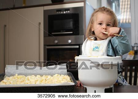 Girl baking cake View Large Photo Image Stock Photography - Girl baking cake . Fotosearch