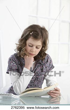 Stock Photography - girl reading a book . Fotosearch