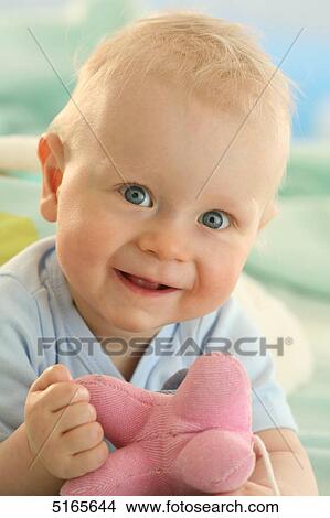 Picture - Happy blond baby . Fotosearch