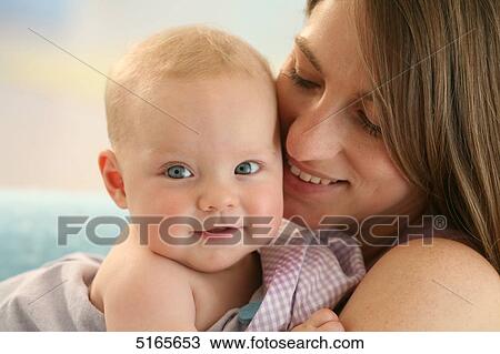 Happy mother with baby View Large Photo Image Stock Image - Happy mother with baby . Fotosearch