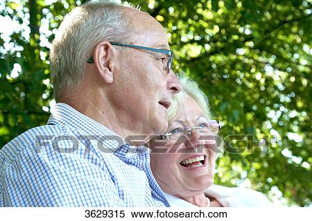 Happy senior couple outdoors View Large Photo Image Stock Photography - Happy senior couple outdoors . Fotosearch