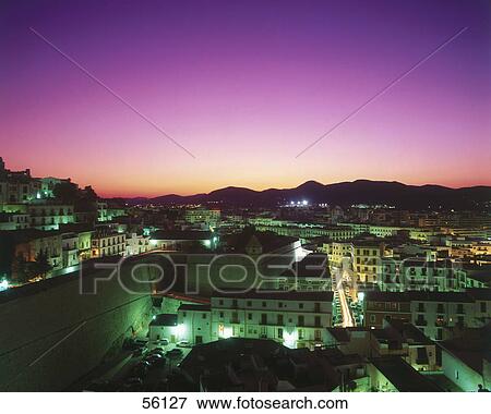 High angle view of a town lit up at night View Large Photo Image Stock Photo - High angle view of a town lit up at night . Fotosearch