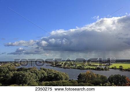 Stock Photography - High angle view of river flowing through landscape, Mecklenburg-Western Pomerania, Germany . Fotosearch