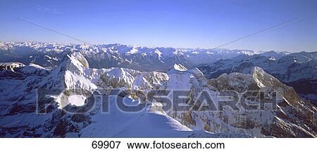 High angle view of snowcapped mountains, Santis, Appenell, Switzerland View Large Photo Image Stock Photo - High angle view of snowcapped mountains, Santis, Appenell, Switzerland . Fotosearch