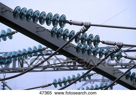 Stock Photography - High voltage power cables against blue sky . Fotosearch