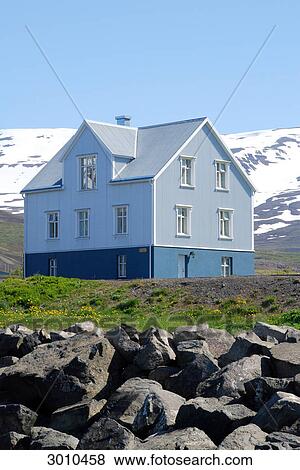 House with snow-covered mountains in the background, Grenivik, Iceland, low angle view View Large Photo Image Stock Photo - House with snow-covered mountains in the background, Grenivik, Iceland, low angle view . Fotosearch