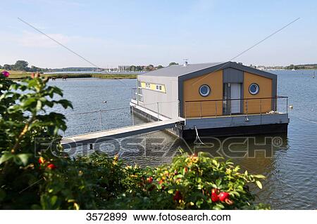 Houseboat on Schlei, Kobberby, Schleswig-Holstein, Germany, Europe View Large Photo Image Stock Photo - Houseboat on Schlei, Kobberby, Schleswig-Holstein, Germany, Europe . Fotosearch