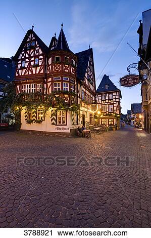 Inn Altes Haus on market square in the evening, Bacharach, Germany View Large Photo Image Stock Image - Inn Altes Haus on market square in the evening, Bacharach, Germany . Fotosearch