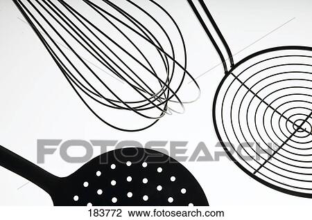 Stock Image - Kitchen utensils against white background . Fotosearch