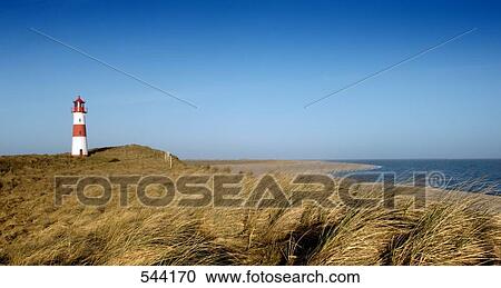 Stock Image - Lighthouse at coast, Sylt, Schleswig-Holstein, Germany . Fotosearch