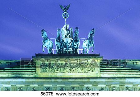 Lit up sculpture on top of archway, Brandenburg Gate, Berlin, Germany View Large Photo Image Stock Photo - Lit up sculpture on top of archway, Brandenburg Gate, Berlin, Germany . Fotosearch