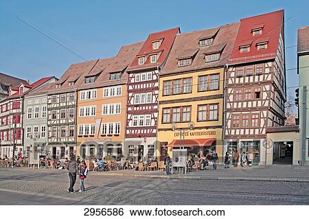 Lively pavement cafe at the Cathedral Square of Erford, Germany View Large Photo Image Stock Photograph - Lively pavement cafe at the Cathedral Square of Erford, Germany . Fotosearch